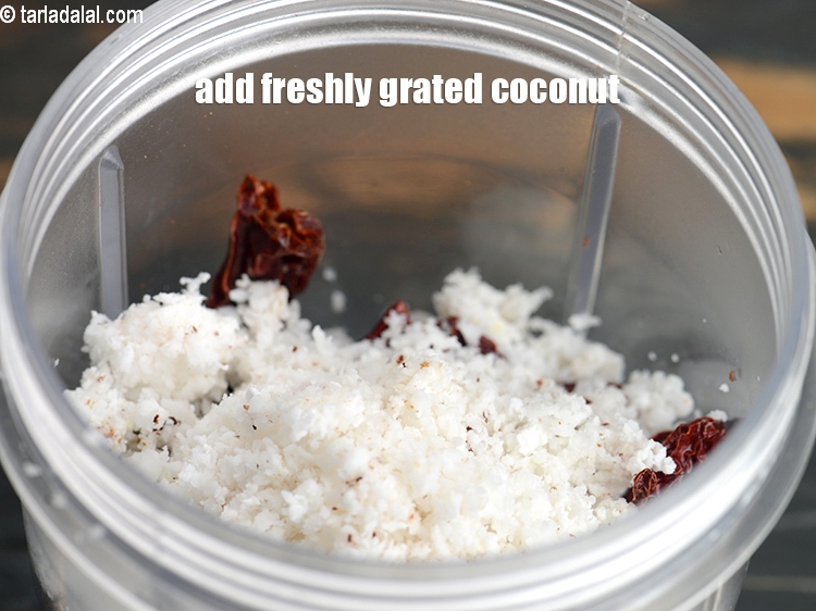 Step 12 – Add 3 tbsp freshly <a href="https://www.tarladalal.com/glossary-grated-coconut-852i">grated coconut</a>.