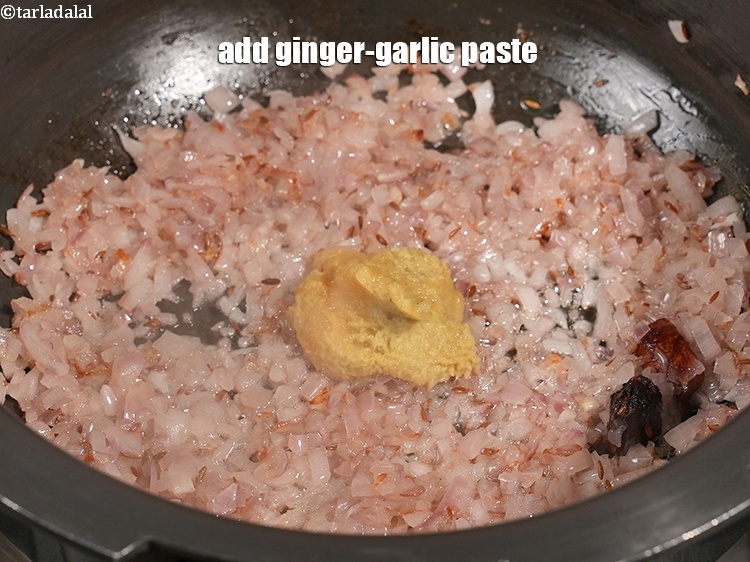Step 11 – Add 1 tbsp <a href="https://www.tarladalal.com/glossary-ginger-garlic-paste-adrak-lehsun-ki-pate-adrak-lahsun-ki-paste-939i">ginger-garlic (adrak-lehsun) paste</a>.