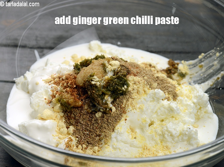 Step 10 – Add 1 tsp <a href="https://www.tarladalal.com/glossary-ginger-adrak-453i">ginger (adrak)</a>&nbsp;<a href="https://www.tarladalal.com/glossary-green-chilli-paste-hari-mirch-ki-paste-mirchi-paste-333i">green chilli paste</a>.