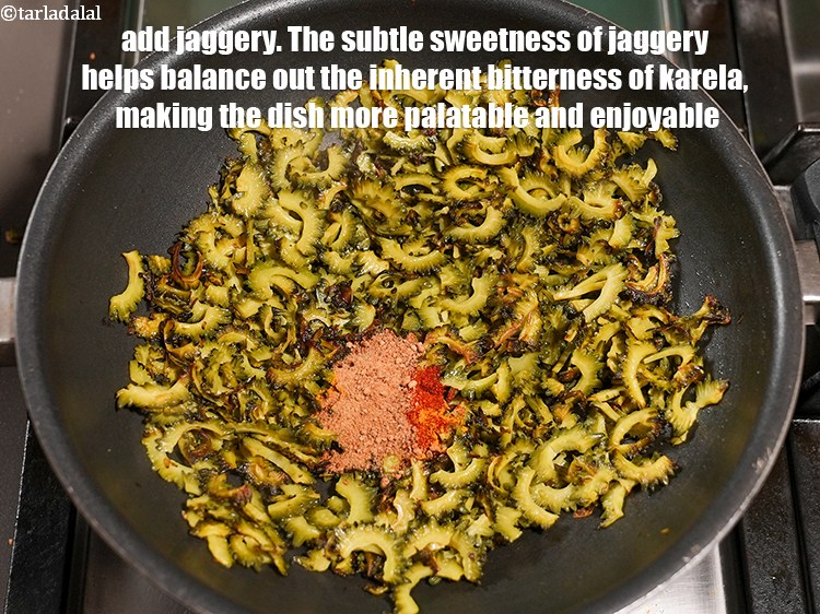 स्टेप 11 – १ टी-स्पून&nbsp;<a href=""https://www.tarladalal.com/glossary-jaggery-gur-gud-kala-gud-hindi-477i"">गुड़</a>&nbsp;डालें। गुड़ की सूक्ष्म मिठास करेले की अंतर्निहित …