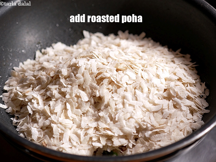 Step 10 – Add 2 cups roasted poha.&nbsp;