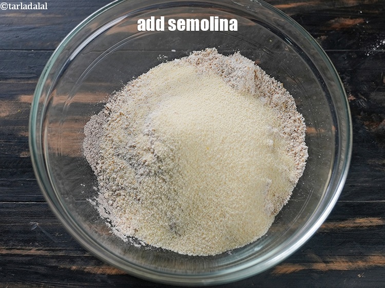 Step 10 – Add 4 tbsp&nbsp;<a href="https://www.tarladalal.com/glossary-semolina-sooji-rava-rawa-603i">semolina (rava / sooji)</a>.