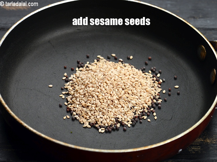 Step 11 – Add 1 tbsp&nbsp;<a href="https://www.tarladalal.com/glossary-sesame-seeds-til-gingelly-seeds-612i">sesame seeds (til)</a>.