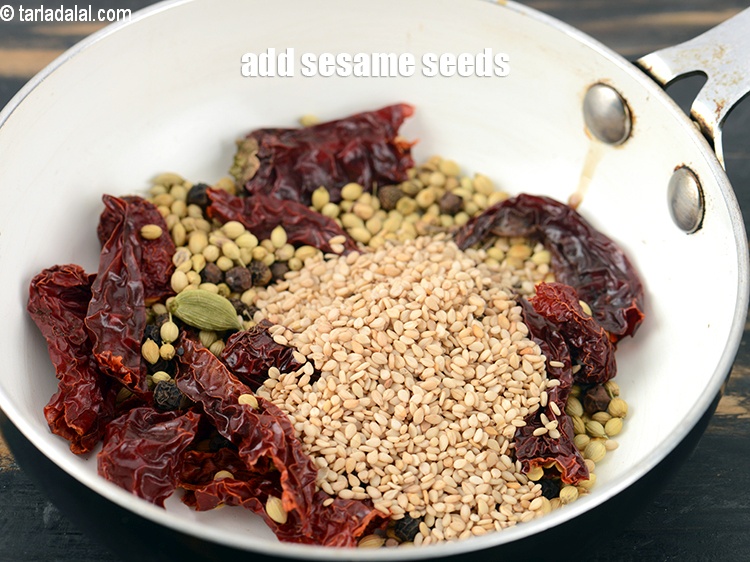 Step 11 – Add 1 tbsp <a href="https://www.tarladalal.com/glossary-sesame-seeds-til-gingelly-seeds-612i">sesame seeds (til)</a>.