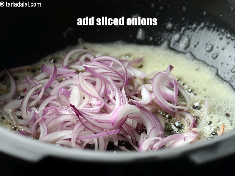 Step 10 – Add 1/2 cup&nbsp;<a href="https://www.tarladalal.com/glossary-sliced-onions-745i">sliced onions</a>.