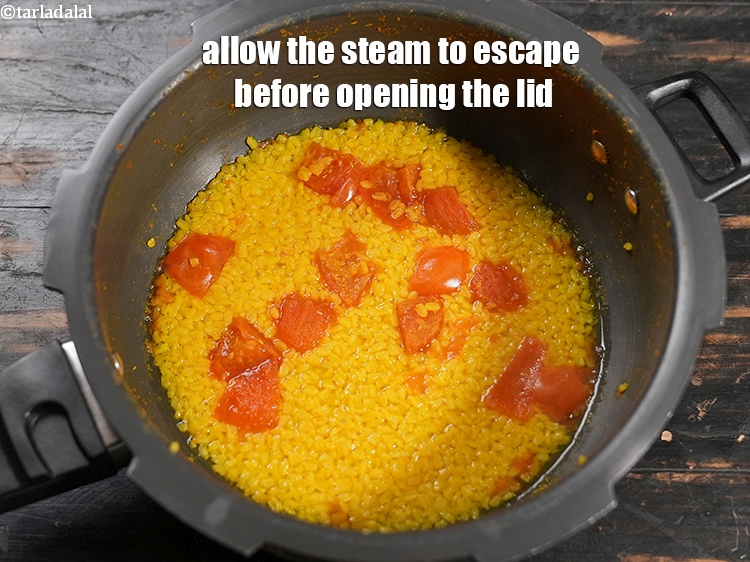 Step 10 – Allow the steam to escape before opening the lid.