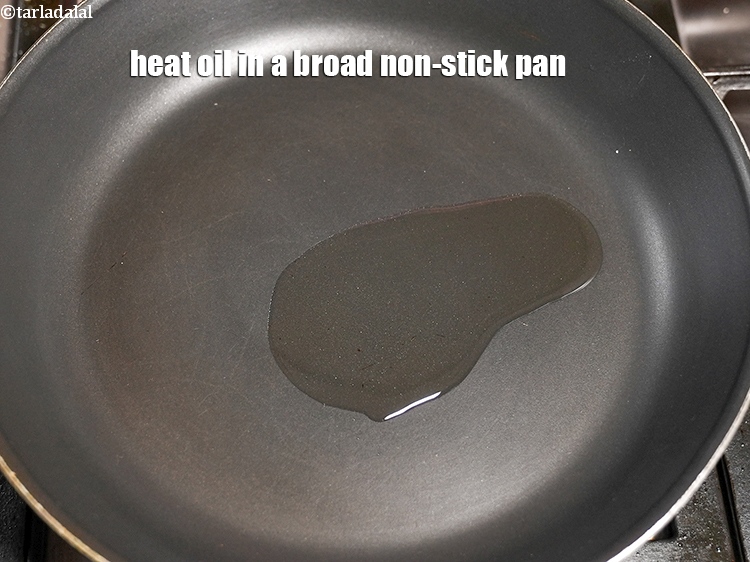 Step 10 – Heat 1 tbsp oil in a broad non-stick pan.