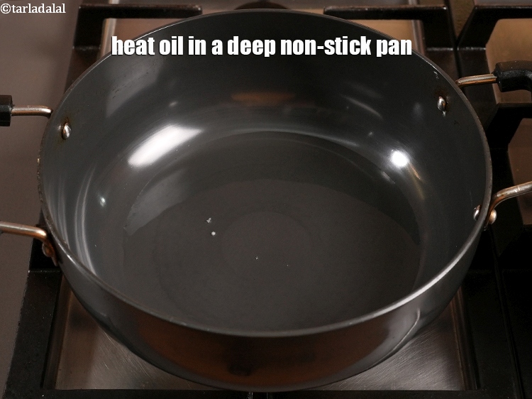 Step 10 – Heat 3 tbsp oil in a deep non-stick pan.