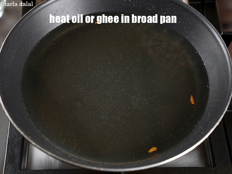 Step 21 – Heat oil or ghee in a broad non-stick pan till it&#39;s very hot.