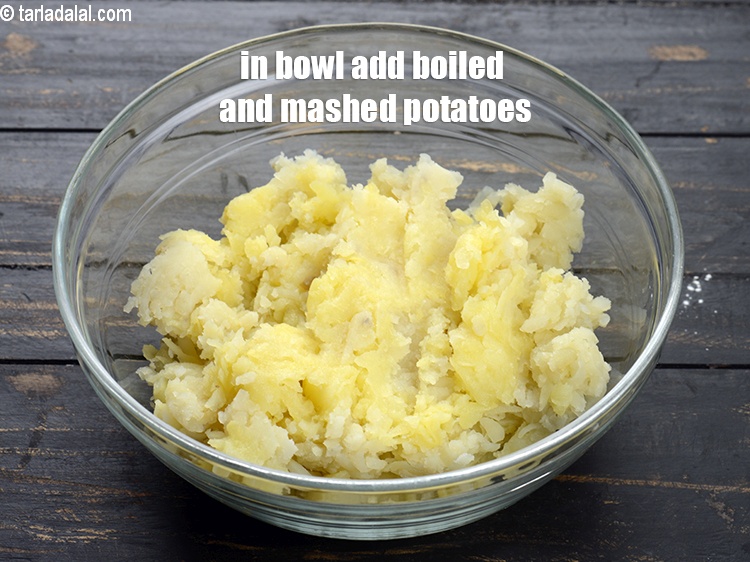 Step 11 – In another big bowl add 3 cups boiled and mashed potatoes.