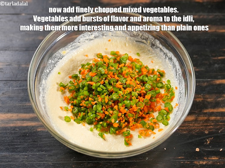 Step 10 – Now add &frac12; cup finely <a href="https://www.tarladalal.com/glossary-chopped-mixed-vegetables-782i">chopped mixed vegetables</a>. Vegetables add bursts of flavor and …
