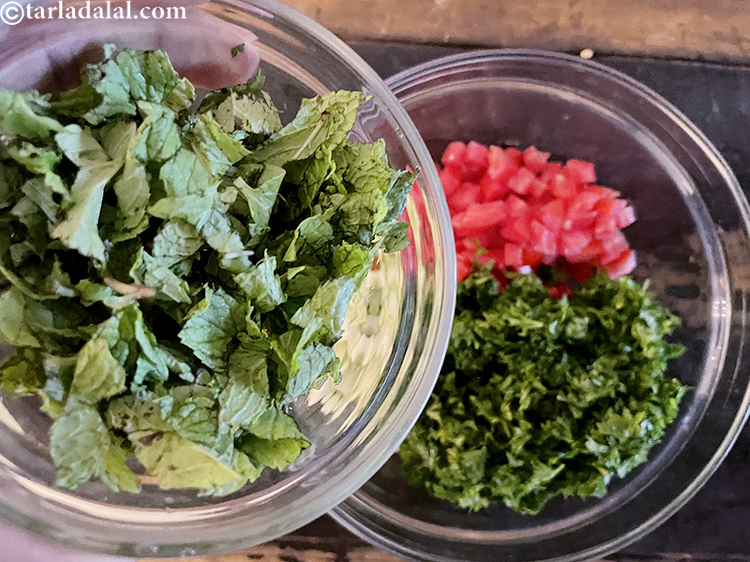 Step 28 – Add 1/3 cup finely chopped pudina.