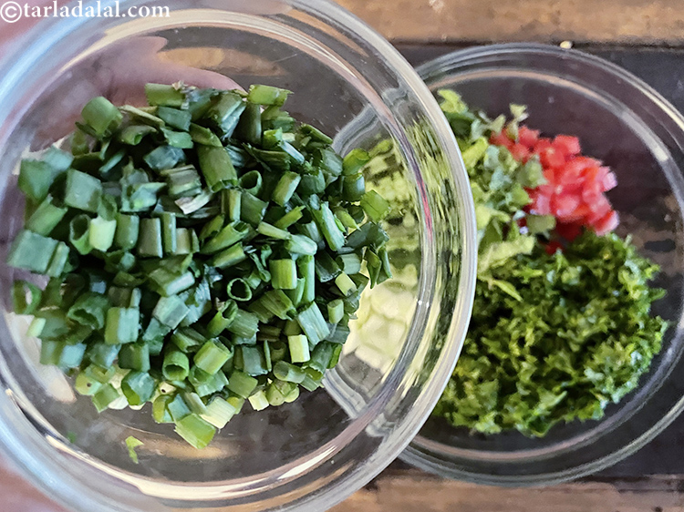 Step 29 – Add 1/3 cup finely chopped green spring onions.