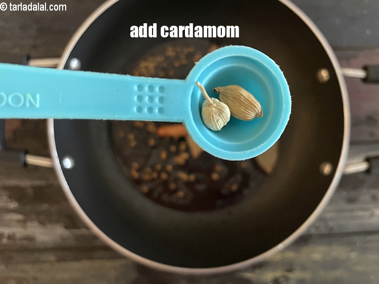 Step 15 – Add&nbsp;<meta charset="UTF-8" />2&nbsp;<a href="glossary-cardamom-elaichi-262i">cardamoms</a>.