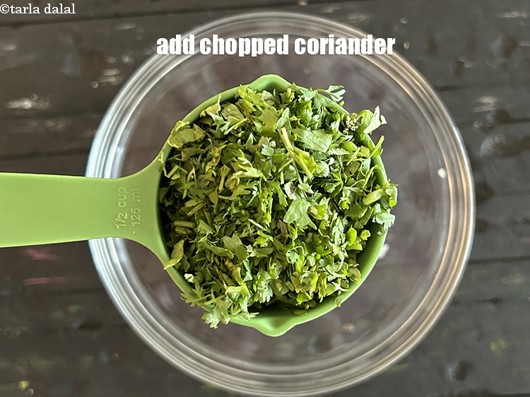 Step 10 – Add&nbsp;<meta charset="UTF-8" />1/2 cup&nbsp;<a href="glossary-chopped-coriander-783i">chopped coriander (dhania)</a>.