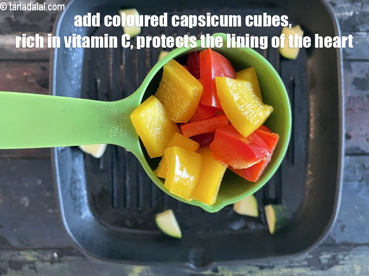 Step 11 – Add&nbsp;<meta charset="UTF-8" />1/2 cup&nbsp;colored&nbsp;<a href="glossary-capsicum-cubes-170i">capsicum cubes</a>.&nbsp;Rich in&nbsp;<a href="https://www.tarladalal.com/recipes-for-Vitamin-C-Rich-Indian-Recipes-804">vitamin C</a>,&nbsp;capsicum&nbsp;protect and maintain the <u><em>lining of the …