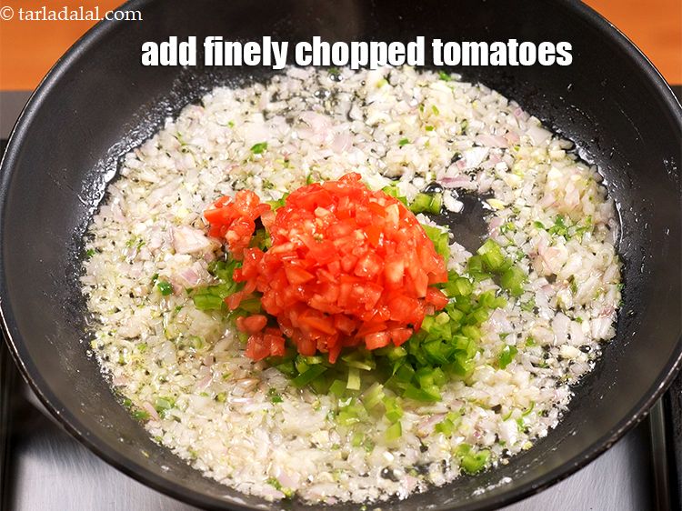 Step 12 – Add &frac12; cup finely&nbsp;<a href="https://www.tarladalal.com/glossary-chopped-tomatoes-779i">chopped tomatoes</a>.