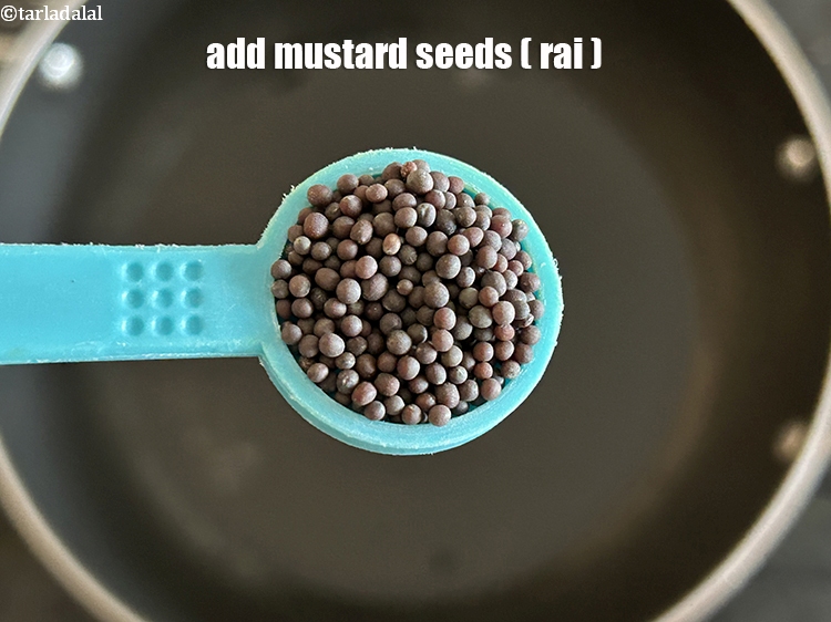 Step 11 – Add&nbsp;<meta charset="UTF-8" />1/2 tsp&nbsp;<a href="glossary-mustard-seeds-sarson-rai-sarson-ke-beej-525i">mustard seeds ( rai / sarson)</a>.