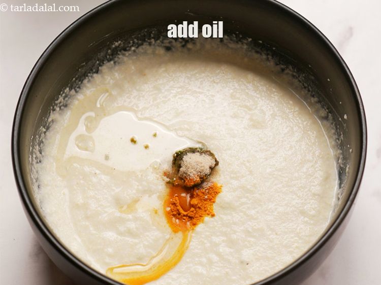 Step 10 – Add 1 tsp&nbsp;<a href="https://www.tarladalal.com/glossary-oil-671i">oil</a>.&nbsp;