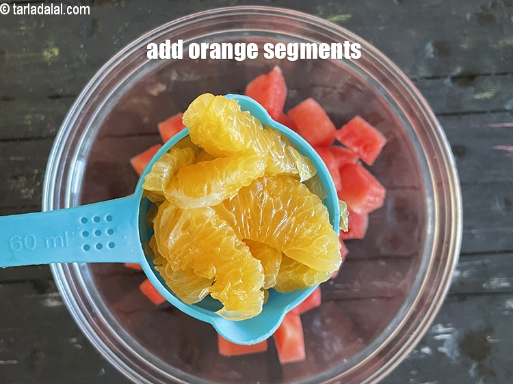 Step 11 – Add&nbsp;<!--%3Cmeta%20charset%3D%22UTF-8%22%20%2F%3E-->1/2 cup&nbsp;<a href="glossary-orange-segments-116i">orange segments</a>.