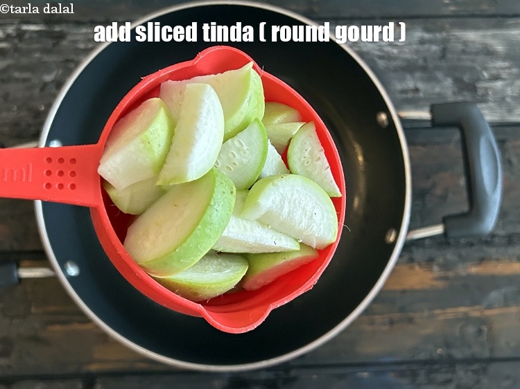Step 10 – Add 4&nbsp;cups&nbsp;<a href="glossary-sliced-round-gourd-833i">sliced round gourd (tinda)</a>&nbsp;, unpeeled.