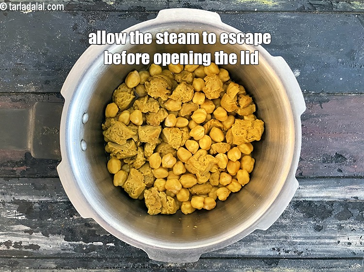 Step 20 – Allow the steam to escape before opening the lid.