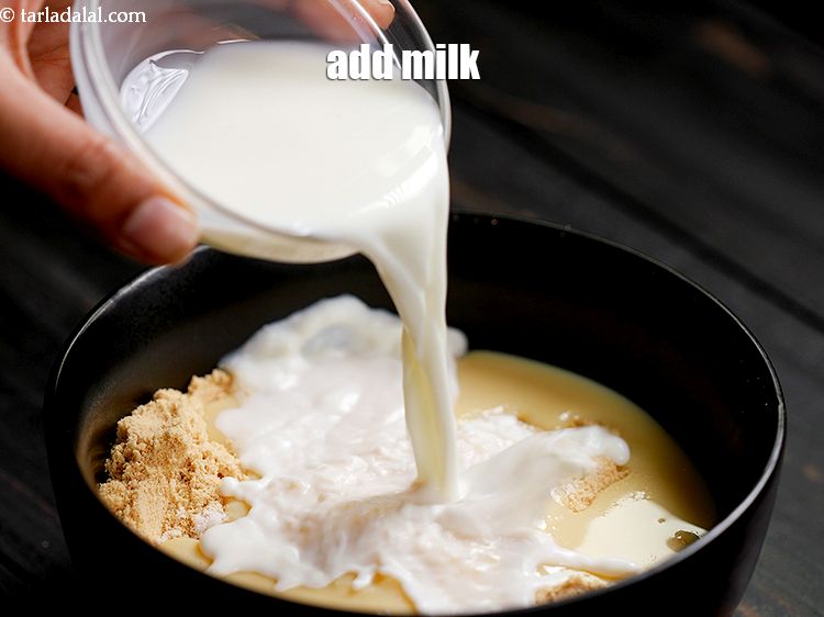 Step 10 – Add 5 tbsp <a href="https://www.tarladalal.com/glossary-milk-doodh-full-cream-milk-514i">milk</a>, make sure the milk used is not hot milk.&nbsp;