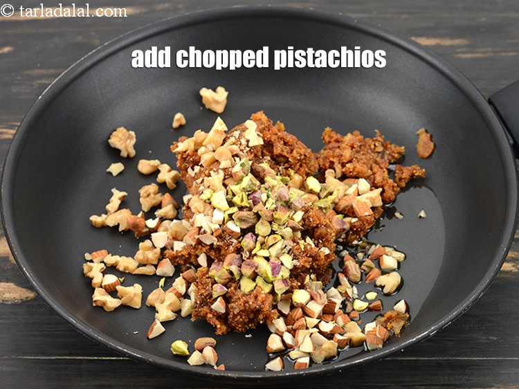 Step 10 – Add 2 tbsp <a href="https://www.tarladalal.com/glossary-chopped-pistachios-893i">chopped pistachios</a>.