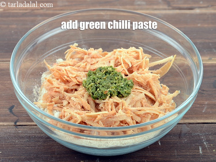 Step 10 – Add 2&frac12; tsp <a href="https://www.tarladalal.com/glossary-green-chilli-paste-hari-mirch-ki-paste-mirchi-paste-333i">green chilli paste</a>.