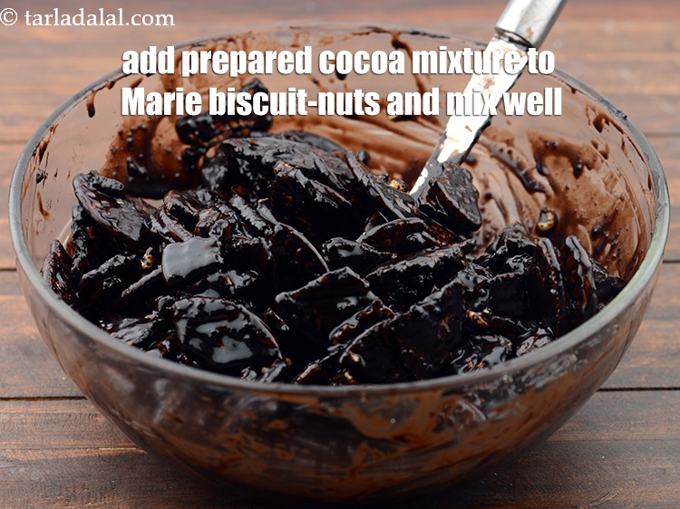 Step 10 – Add the prepared cocoa powder mixture to the Marie biscuit-nuts and mix well.