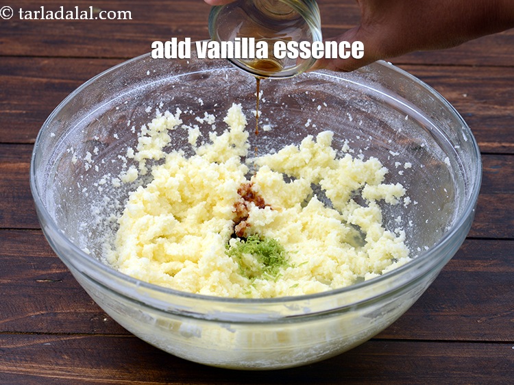 Step 11 – Add 2 tsp&nbsp;<a href="https://www.tarladalal.com/glossary-vanilla-essence-406i">vanilla essence</a>.