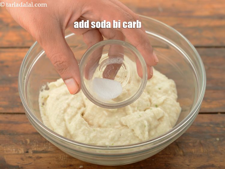 Step 42 – Add the <a href="https://www.tarladalal.com/glossary-baking-soda-soda-bi-carb-615i" target="_blank">soda bi carb</a>.