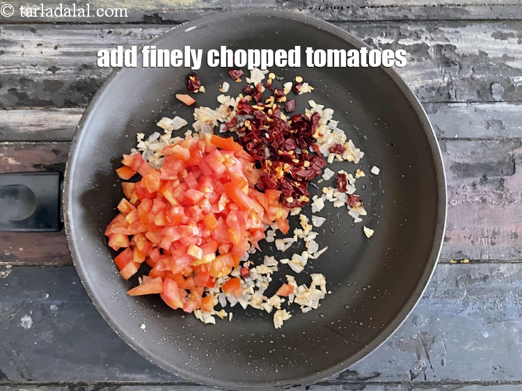 Step 10 – Add&nbsp;<meta charset="UTF-8" />1 cup&nbsp;finely&nbsp;<a href="glossary-chopped-tomatoes-779i">chopped tomatoes</a>.