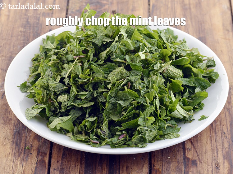 Step 10 – Roughly chop the leaves to make it easier for blending. We will need around 1 …