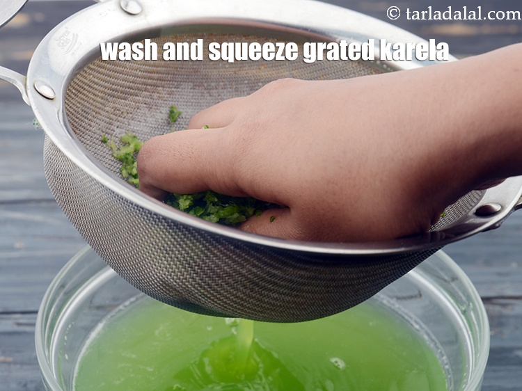 Step 10 – Take a strainer and wash the grated karelas using enough water and squeeze it. Keep …