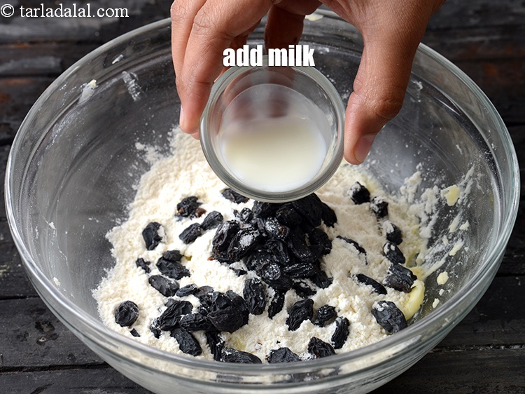 Step 10 – Add 3 tsp&nbsp;<a href="https://www.tarladalal.com/glossary-milk-doodh-full-cream-milk-514i">milk</a>.