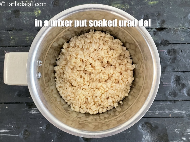 Step 10 – In a mixer put the soaked urad dal.