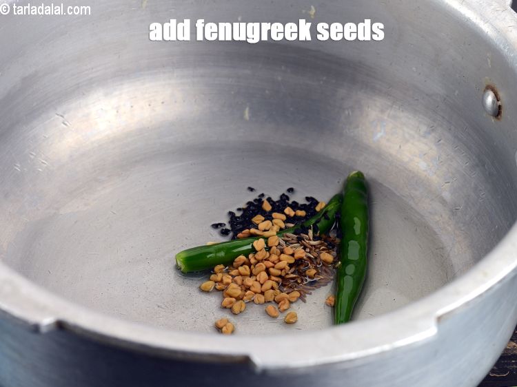 Step 10 – Add &frac14; tsp <a href="https://www.tarladalal.com/glossary-fenugreek-seeds-methi-dana-methi-ke-dane-methi-seeds-991i">fenugreek (methi) seeds</a>.