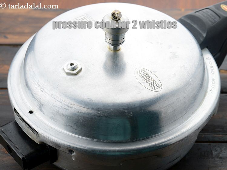 Step 10 – Pressure cook for 2 whistles till the dal is cooked.