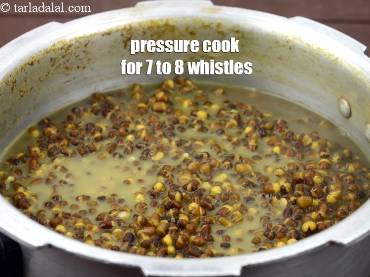 Step 10 – Pressure cook for 7 to 8 whistles or till the dal is overcooked.