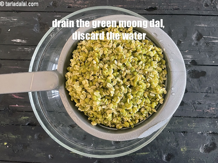 Step 10 – <meta charset="UTF-8" /> Drain the green moong dal using a strainer. Discard the water. Keep …