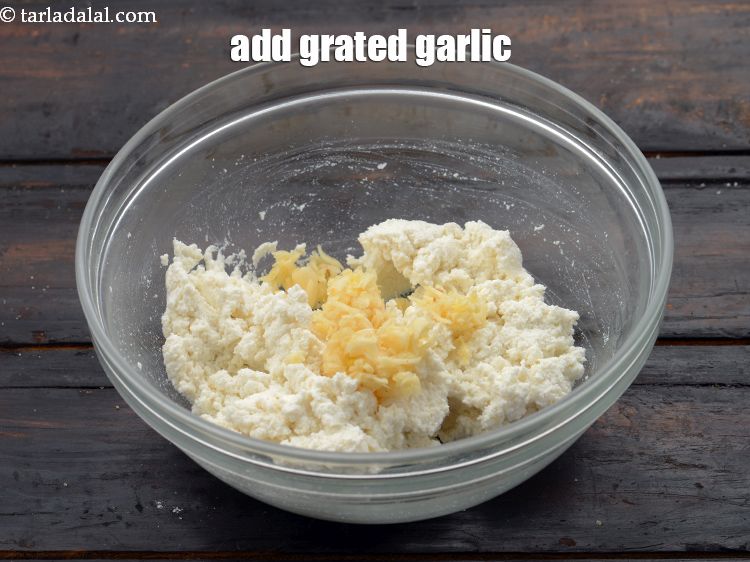Step 10 – Add 1/2 tbsp&nbsp;<a href="https://www.tarladalal.com/glossary-grated-garlic-859i">grated garlic (lehsun)</a>.&nbsp;