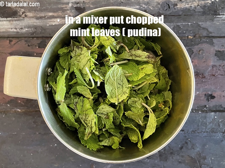 Step 17 – In a mixer put&nbsp;<meta charset="UTF-8" />3/4 cup&nbsp;<a href="glossary-chopped-mint-788i">chopped mint leaves (phudina)</a>&nbsp;, washed and drained.