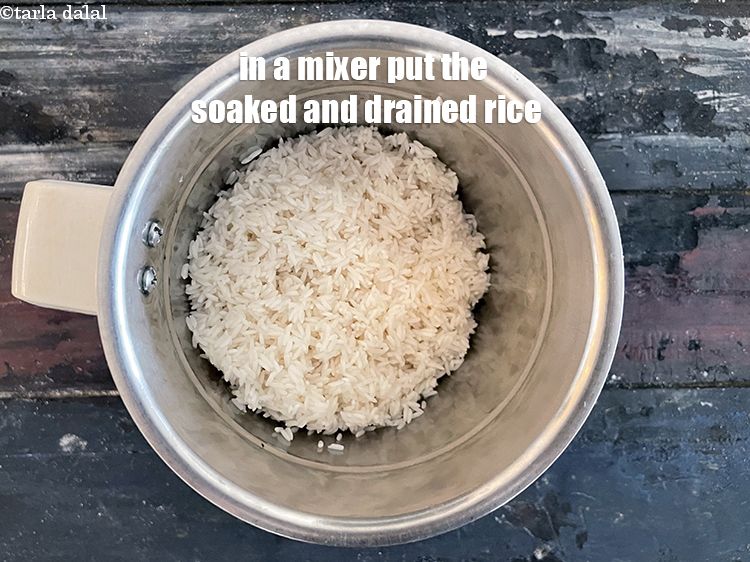 Step 10 – In a mixer put the soaked and drained rice.