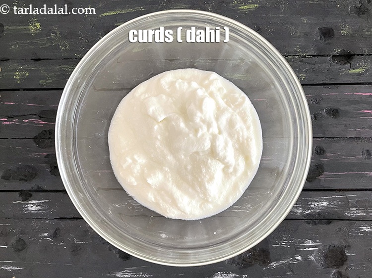 Step 12 – In a deep bowl put&nbsp;<meta charset="UTF-8" />1 cup&nbsp;fresh&nbsp;<a href="glossary-curd-dahi-yogurt-yoghurt-383i">curds (dahi)</a>.
