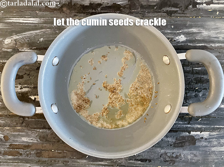 Step 17 – Cook for a few seconds and let the cumin seeds crackle.