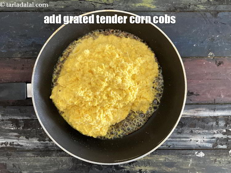 Step 13 – Add&nbsp;<meta charset="UTF-8" />6&nbsp;<a href="glossary-grated-sweet-corn-cob-1848i">tender corn cobs , grated</a>. See above on how to grate corn.