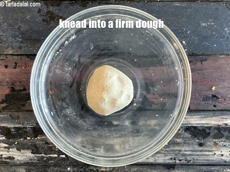 Step 10 – <meta charset="UTF-8" />Knead well into a firm dough.&nbsp;