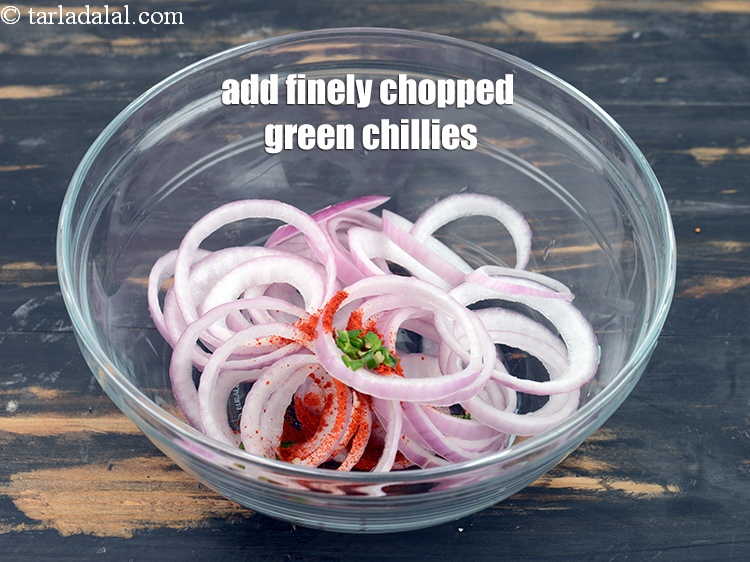 Step 10 – Add &frac12; tsp finely <a href="https://www.tarladalal.com/glossary-chopped-green-chilli-820i">chopped green chillies</a>.
