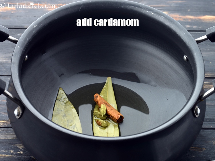 Step 11 – Add 3&nbsp;<a href="https://www.tarladalal.com/glossary-cardamom-elaichi-262i">cardamoms (elaichi)</a>.&nbsp;